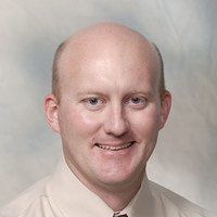 Mr. T. Adam Tullos