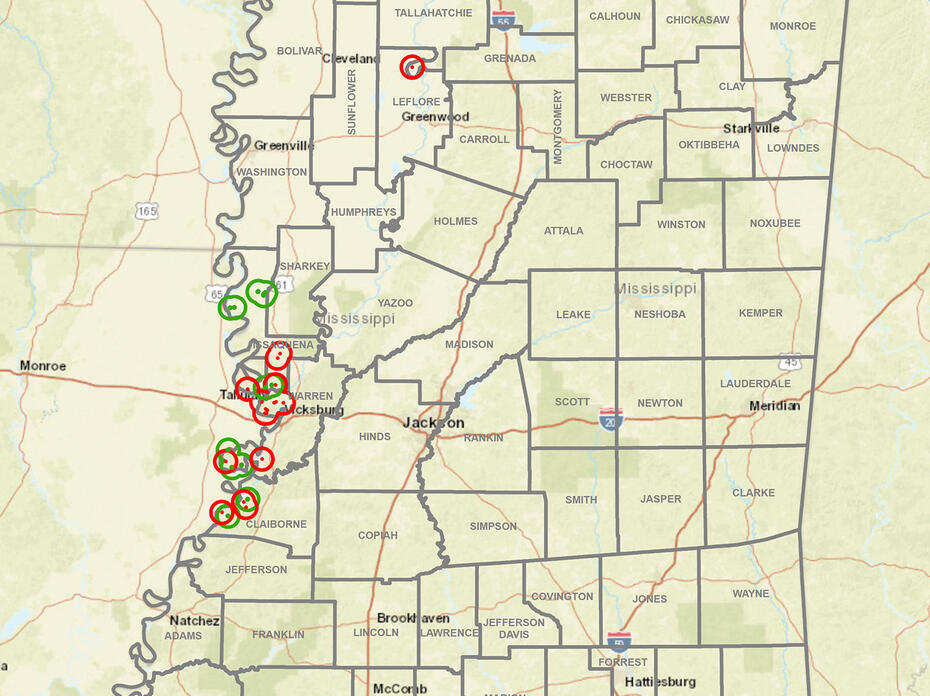 A map of Mississippi has data marked with red and green circles.