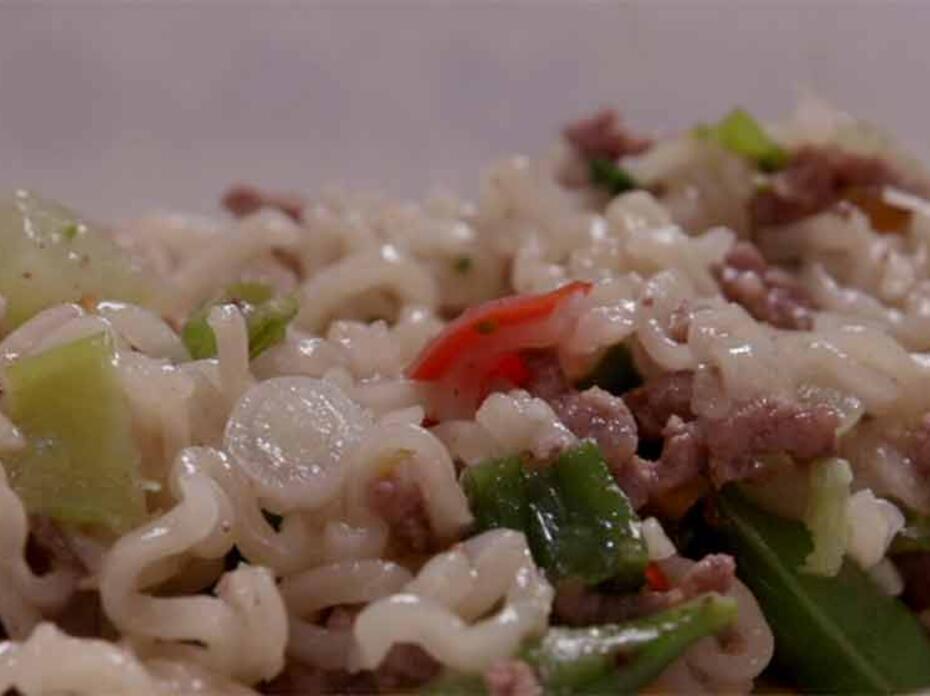 Cooked noodles, vegetables, and beef.