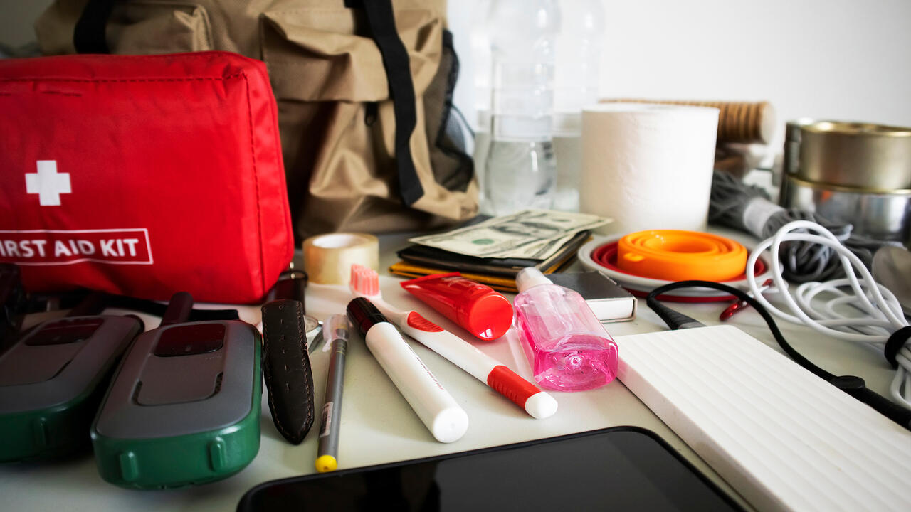 Various items needed in an emergency kit. 